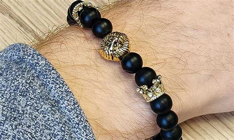 bracciali di gucci leone faccia diamanti e perle|FARFETCH .